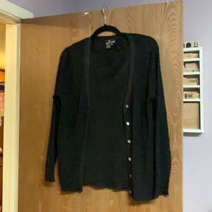 Sleeve sweater and cardigan set.  Sparkles in fabric.